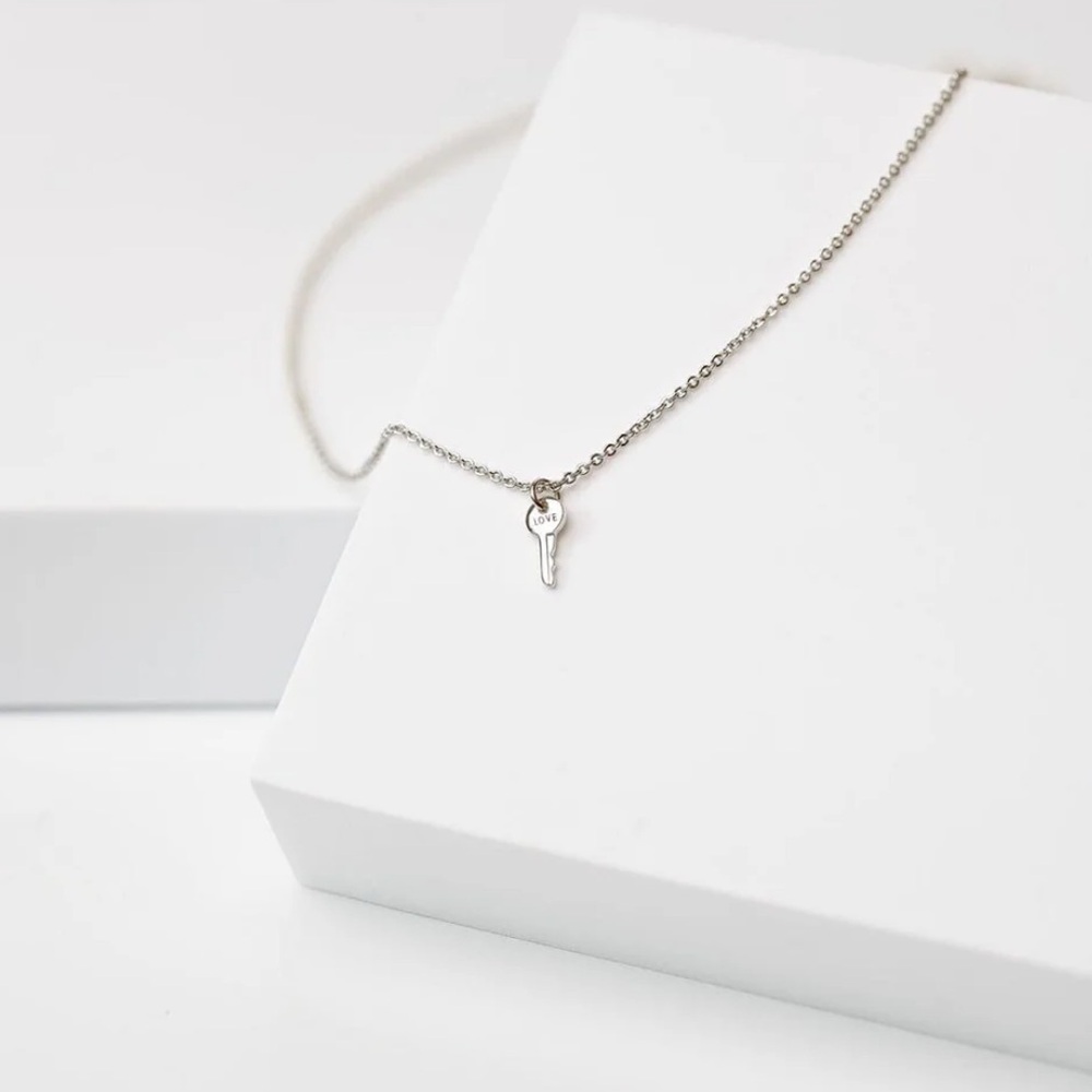 Mini key “BELIEVE” necklace